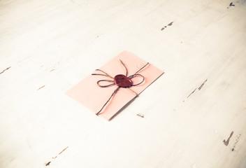 Letter with seal on table