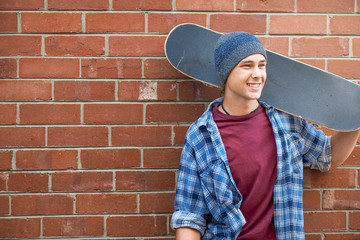 Handsome guy with skateboard