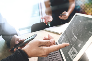 two colleague web designer discussing data and digital tablet do