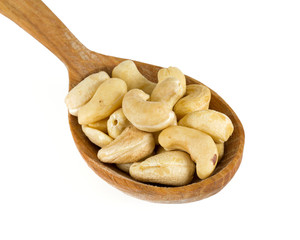 cashew nuts in a wooden spoon