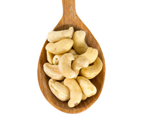 cashew nuts in a wooden spoon
