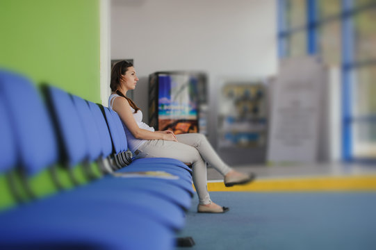 girl waiting at the airport