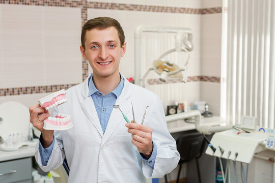 Young dentist in the office