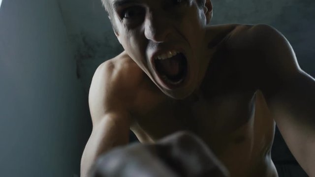 portrait of a dangerous man threatening finger at the camera