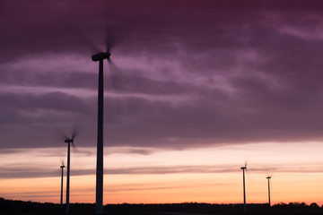 Windturbines at sunset