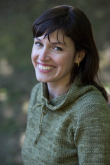 Athletic Woman with Brown Hair and Beautiful Green Eyes