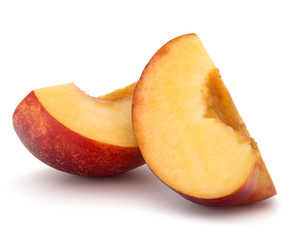 Nectarine fruit slice isolated on white background close up