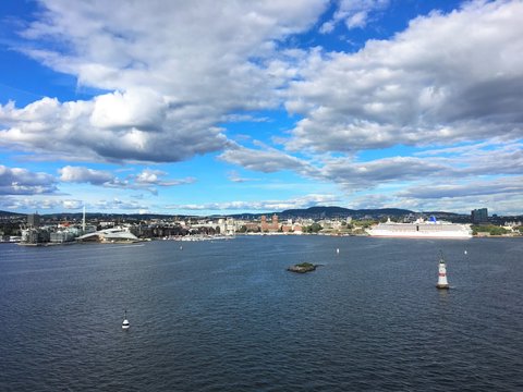 Oslo, the capital of Norway. Photo taken from the fjord in northern direction. Areas on this picture: Tjuvholmen, Aker Brygge and Oslo city hall.