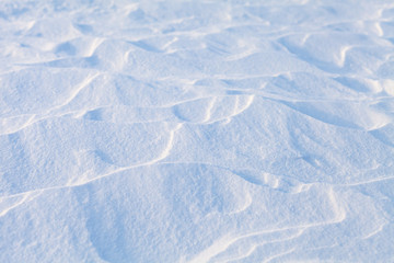 snow texture on the lake on a sunny day