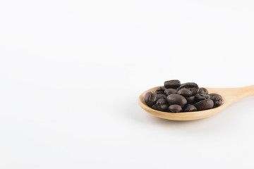 Roasted Coffee beans on a white background.