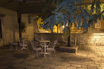 Fototapeta na wymiar Little vintage cafe bar at night