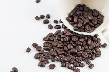 Roasted Coffee beans on a white background.