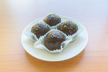 Brown chocolate on wooden table