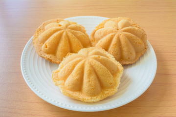 Bread with flower shape on wooden table