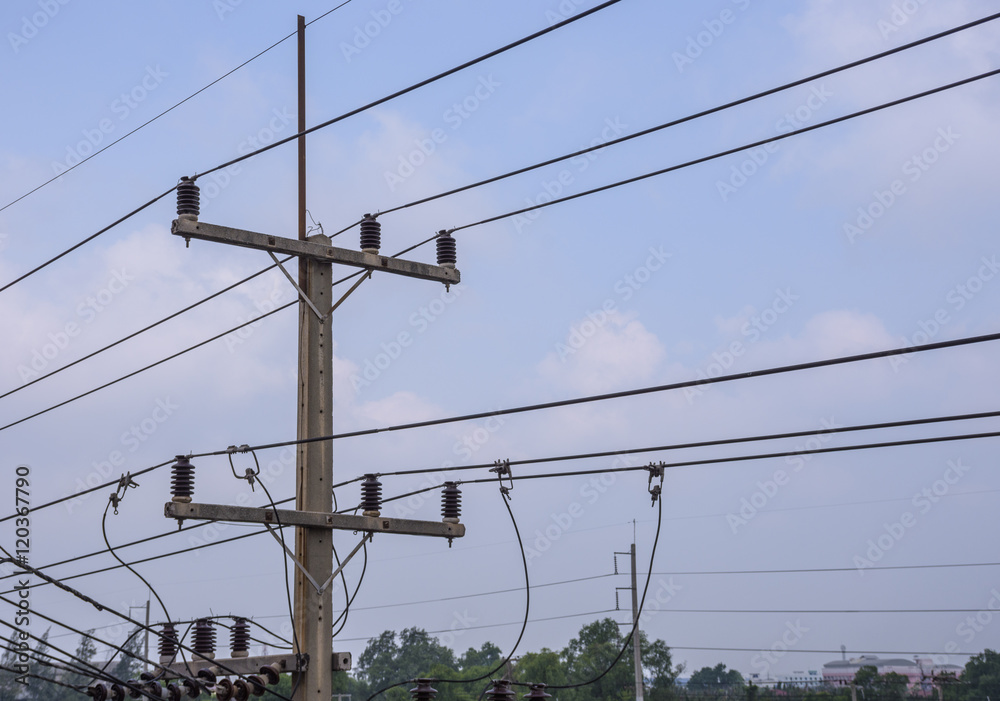 Wall mural high voltage electricity pole with blue clear sky background