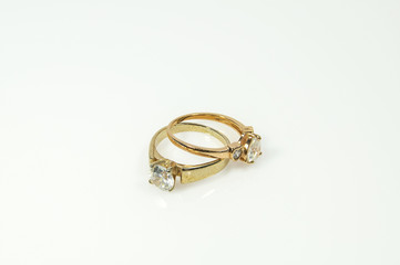 Gold ring with diamonds isolated on white background.