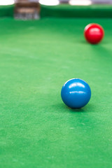 Snooker balls on snooker table.