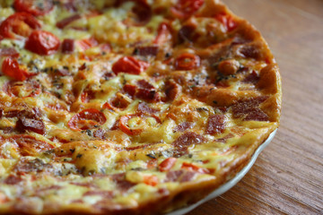 Scrambled eggs with red pepper,tomatoes,sausage.