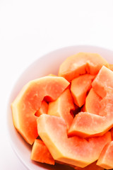 Fresh papaya slices on plate and ready for eating