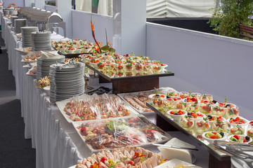 Banquet Table in restaurant served with different meals.