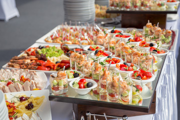 Banquet Table in restaurant served with different meals.