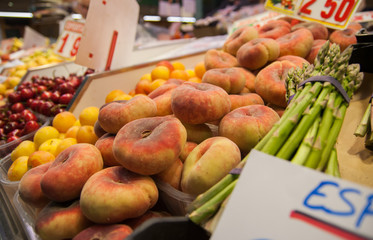 Flat peaches or  Donut peaches at market. Barcelona. Spain