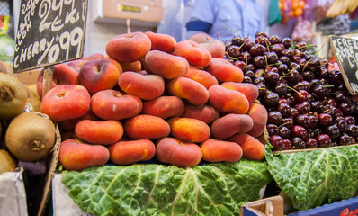Flat peaches or  Donut peaches at market. Barcelona. Spain