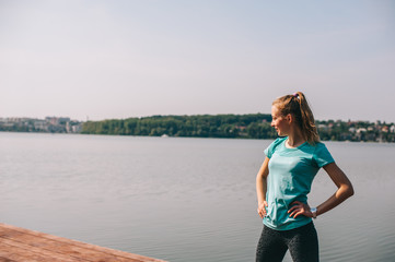 She performs exercises on pier