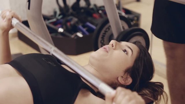 Strength training with a guide in a gym