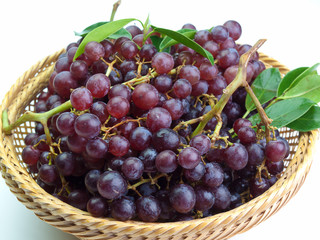 Close up red grape with leaves