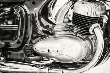 Detail of veteran motorbike, meeting bikers, black and white