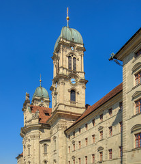 Fototapeta premium Clock tower of the Einsiedeln Abbey in the town of Einsiedeln, Switzerland