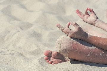 Child making yoga exercises