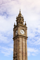 Fototapeta na wymiar Belfast Clock tower over cloudy sky