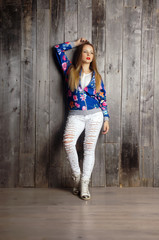 girl wearing blue cardigan.Isolated studio portrait