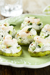 Shrimp appetizer with chili pepper, zucchini and cottage cheese