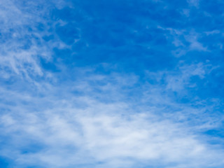 Naklejka na ściany i meble Cirrus cloud in blue sky