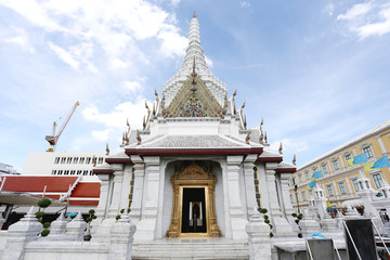 The City Pillar Shrine of Bangkok on the background blue sky.