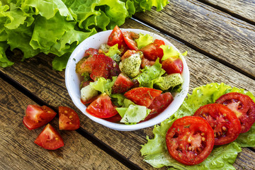 salad of cucumber and tomato with dill
