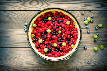 Wild berry pie with raspberries and blueberries