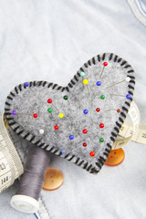 Heart shaped pincushion and tailor accessories
