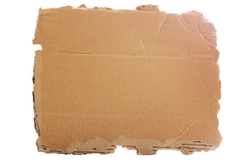 Brown corrugated cardboard torn and isolated on white.