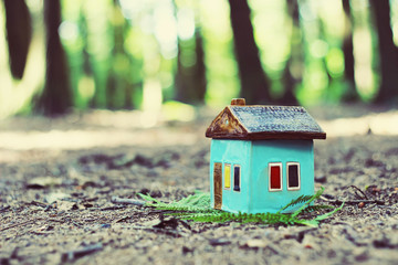 Obraz na płótnie Canvas toy handmade ceramic house outdoor 