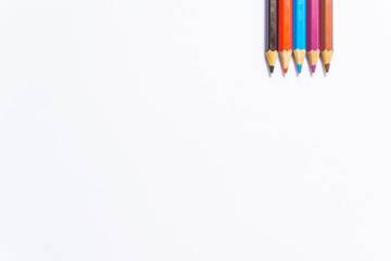 Colour pencils isolated on white background close up 