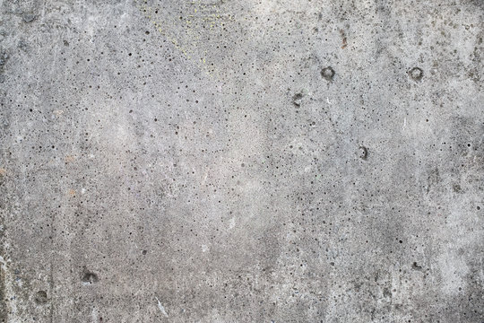 Grey cement texture. Old grungy concrete wall background.
