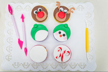 Closeup of funny christmas cupcakes