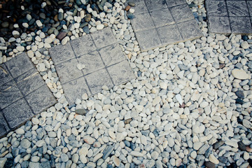 Block and white ,gray ,orange pebbles background