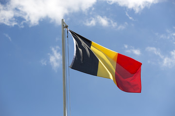 National flag of Belgium on a flagpole