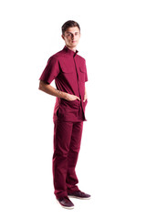 Young nurse boy in red uniform isolated