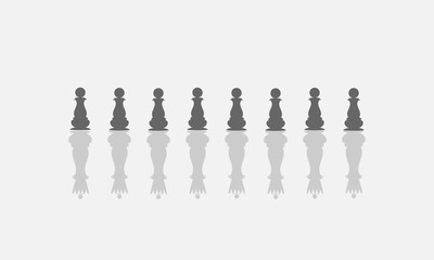 chess pawns in the shadow of the Queen. The concept of pride, self-confidence.